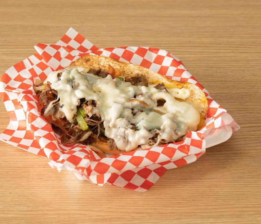 Philly cheesesteak/Chicken Philly Fries · Your choice beef or chicken philly cheesesteak,  peppers, onions, provolone cheese and bullez sauce on top of a pile of hot French fries

Make it a combo - add drink for $1.50