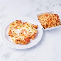 Breast of Chicken Parmigiana · Breaded chicken cutlet with mozzarella and tomato sauce. Served with pasta or salad.