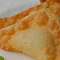 crab rangoon · 6 pc rangoon wrapped with cream cheese, crabstick and serve with our famous dipping sauce 
