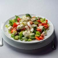 Greek Salad · Romaine, tomatoes, cucumbers, bell peppers, Kalamata olives, onions, feta, extra-virgin oliv...