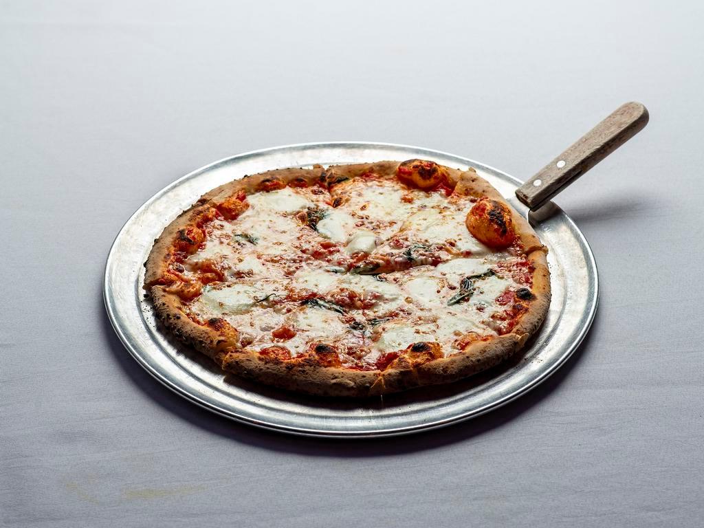 Margherita Pizza · Mozzarella, basil, crushed tomato sauce.