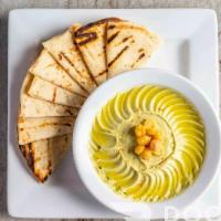 Avocado Hummus · Chickpea, tahini, avocado & cilantro dip with pita bread. Vegetarian. 