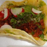 8B. Carnitas Taco · Mexican-style soft corn tortillas with lettuce.