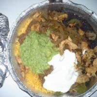 23A. Combo Fajita · Served with rice and beans, sour cream, guacamole and tortillas.