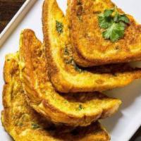 French Toast · Pan-fried bread soaked in an omelet batter.