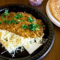 Paneer Cheese Masala · Paneer pieces cooked in a ginger-garlic gravy and topped with cheese.