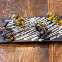 Roasted Vegetable Skewers · Roasted Carrots and brussel sprouts, vegan citrus Aioli, pumpkin seed and sunflower seed bri...