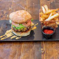 Beef Burger · Dry aged beef, lettuce, tomato, special sauce and pickles on side
