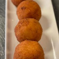 Traditional Rice Ball Special · Served with mozzarella, ricotta cheese and sauce.
