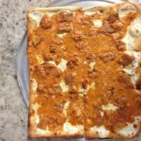 Thin Crust Sicilian Pie · Served with vodka sauce and topped with crispy chicken.