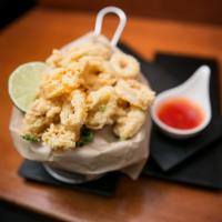 Crispy Calamari · Fried tempura battered squid served with sweet chili sauce.