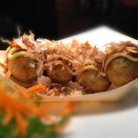 Takoyaki (4pcs) · Octopus balls battered w. scallions, served w. katsu sauce, mayo & bonito flakes