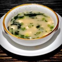 Miso Soup · Soybean paste with tofu, scallions and seaweed. Vegetarian and gluten free.