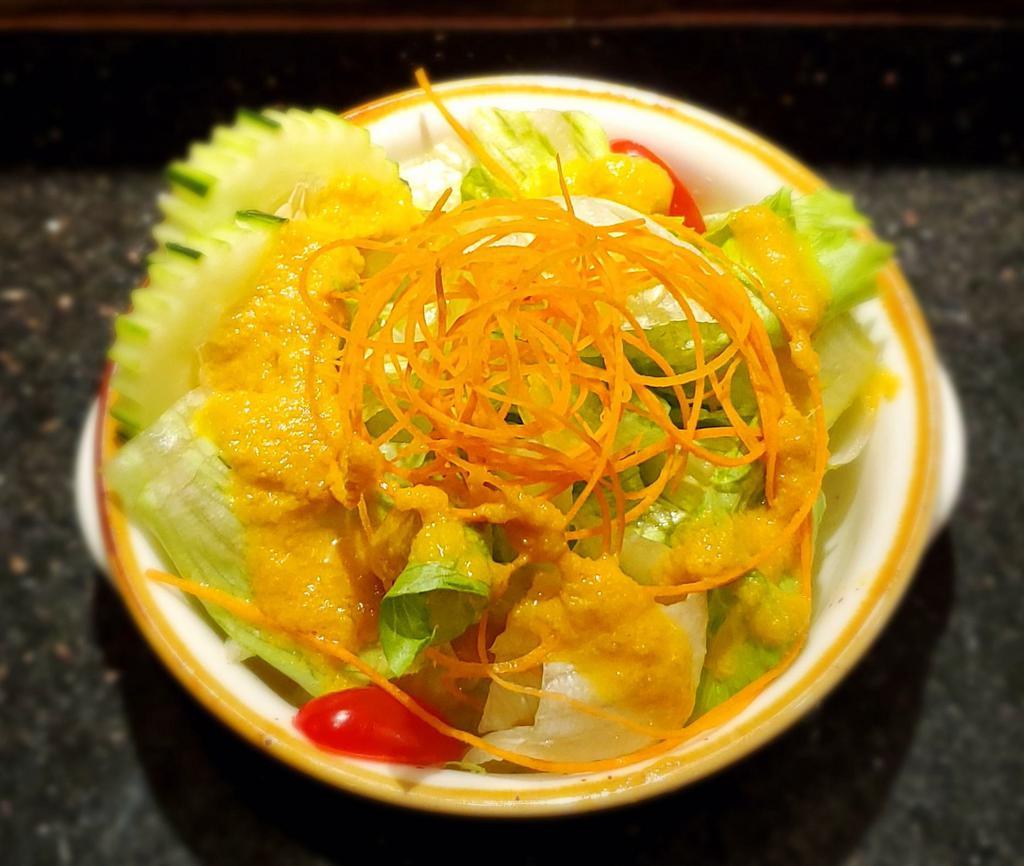 Garden Salad · Mixed greens with sweet ginger dressing. Vegetarian.