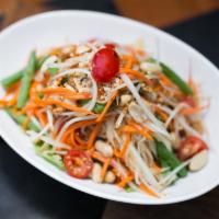 Thai Salad · Mixed greens with bean sprout, tomato, crispy tofu, cucumber, carrot and peanut sauce. Veget...