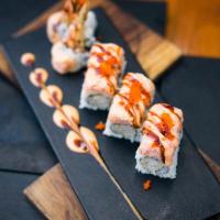 Angry Lobster Roll · Shrimp tempura and cucumber inside topped with Japanese crawfish salad, caviar, spicy mayo a...