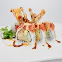 Dancing Spider Roll · Soft shell crab, avocado and cucumber inside, topped with spicy tuna, spicy mayo and eel sau...