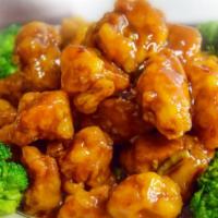 Tangy Rocky Chicken · Fried battered chunky chicken in our signature spicy sweet tangy sauce & steamed brocolli.
S...