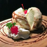 Tempura Ice Cream · An Ice Cream flavor of your choice wrapped in a tempura batter served with whipped Cream, ch...