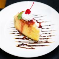 Fried Cheesecake · Classic Cheesecake fried in tempura batter served with strawberry sauce, whipped cream, and ...