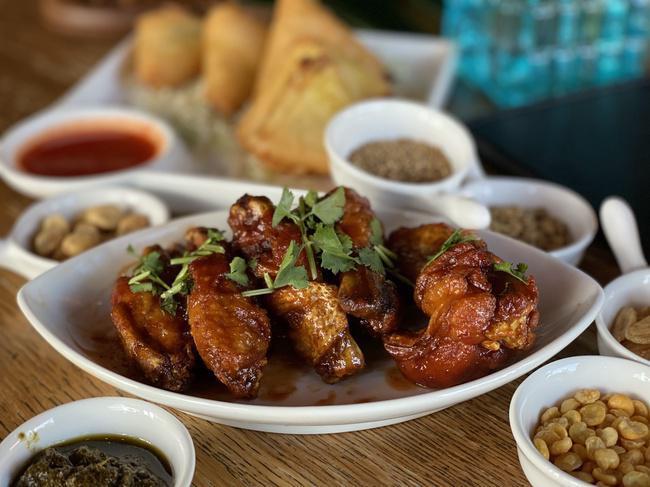 Tamarind Hot Wings. · Beaverton Exclusive. Burmese Home Style Tumeric fried chicken wings 