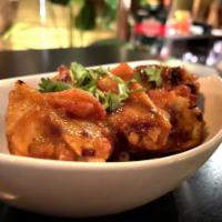 Sweet Mango Wings. · Burmese homestyle chicken wings marinated with House Mango chutney. Juicy, sweet, and tangy....