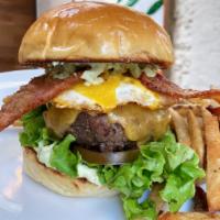 BREAKFAST BURGER · Prime Beef Burger, Over Easy Egg, Maple Bacon Cheddar Cheese, Avocado Aioli, Tomato, Lettuce...