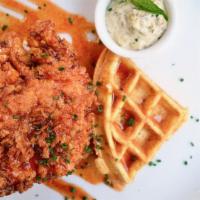 CHICKEN AND WAFFLES · Belgian style with buttermilk chicken breast &  maple syrup &  butter.