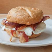 BREAKFAST SANDWICH · 2 Eggs Any Style, Bacon, American On A Kaiser Roll
