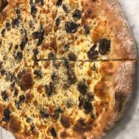 The Shroom Pizza · Cremini and oyster mushrooms, fresh oregano, truffle oil, mozzarella and garlic oil.