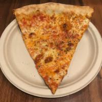 The Rita Pizza Slice · Tomato, mozzarella and basil.