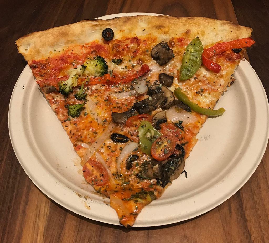 Bushwick Veggie Pizza Slice · Tomato, mozzarella, bell peppers, onion, mushrooms and broccoli.