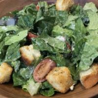 Caesar Salad · Romaine lettuce, house Caesar and croutons, Parmigiano-Reggiano and cherry tomatoes.