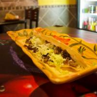 Quesadilla de Bistec · Large tortillas with steak, lettuce, and cheese