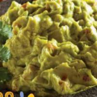 Tableside Guacamole · Homemade fresh guacamole mixed with pico de gallo.