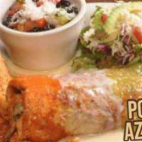 Pollo Azteca · 10 oz. chicken breast stuffed with spinach and shrimp, covered with ranchero sauce. Served w...