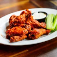 Chicken Wings · 8 Pieces of our Famous Wings. Choose your flavor: Barbecue, Buffalo, Cajun, or Garlic Parmes...