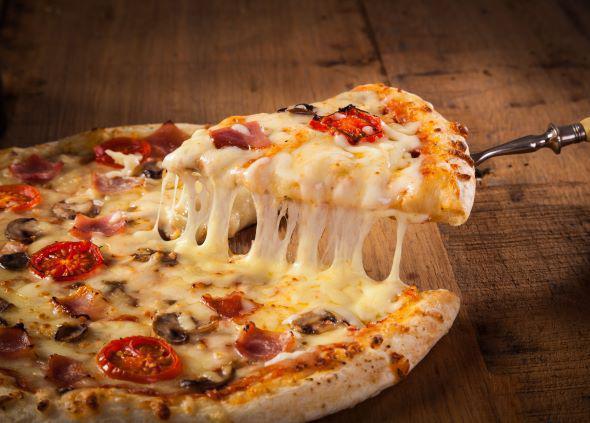 Alfredo Pizza · Alfredo sauce, grilled chicken, mushroom, bacon and tomato.
*Thin Crust Not Available in Kid Size Pizza*