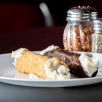Cannoli · Fried Italian Pastry Shell Filled with Sweet Marscapone Cheese and Chocolate Chips and duste...