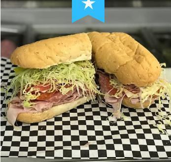 Italian Sub · Sliced ham, pepperoni, salami, hot pepper cheese or provolone cheese, lettuce, tomato, red onion, banana peppers, and Italian dressing on a sub bun.