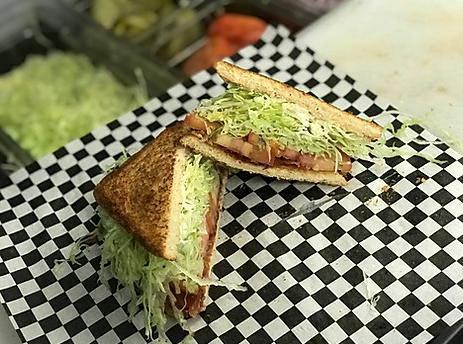 BLT Sandwich · Bacon, lettuce, tomato, and mayo on toasted white bread.