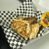 Cheese Quesadilla's · 1- 12 inch tortilla cut in fourth's. Our quesadilla’s are made with a Monterey Jack cheese b...