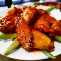 10 Jumbo Chicken Wings Meal · Served with blue cheese and celery, Buffalo, BBQ or garlic sauce and a 1/2 order of fries