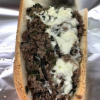 Italian Cheesesteak · Beef or chicken topped with spinach and sharp provolone cheese in our famous bread.