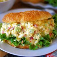 Egg Salad Sandwich · A cold creamy sandwich made with chopped eggs, mayo, and seasoning.