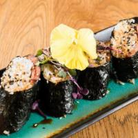 Spam Musubi  · Pan seared spam, on sushi rice rolled in seaweed, with scallions, and eel sauce. A Hawaiian ...