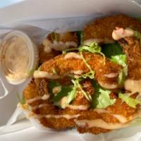 Coconut Shrimp (5 Pieces) · Coco Lopez marinated jumbo shrimp fried to perfection. Served with sweet Thai mayo dipping s...