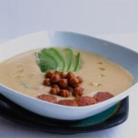 Creamy Chickpea Soup · 8oz Homemade chickpea soup with Avocado and Chorizo