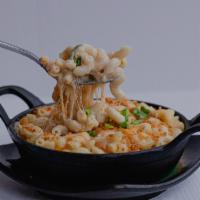 Mac N' Cheese · Homemade Béchamel, mixed cheese, parmesan, bread crumbs, baked to golden
melted perfection. ...