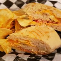 United Nations Sandwich Lunch · Turkey, tomato, melted Swiss and Russian dressing on a toasted French baguette. Served with ...